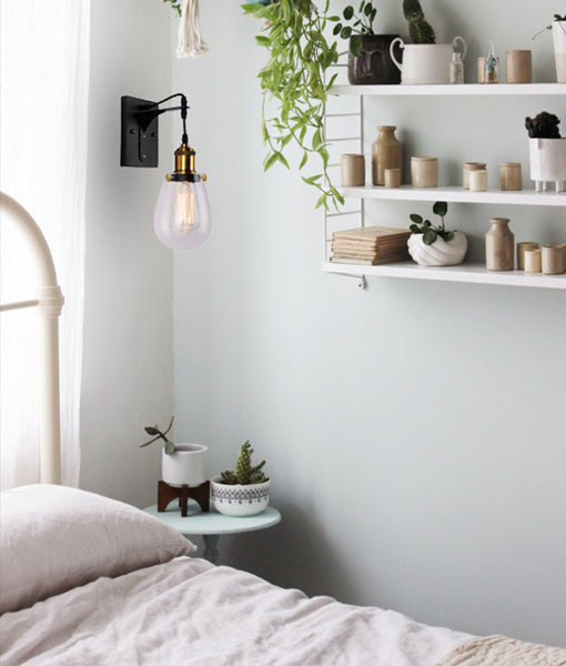 STRUNG: Interior Decorative Black / Antique Brass and Clear Pear Shape Glass Wall Light